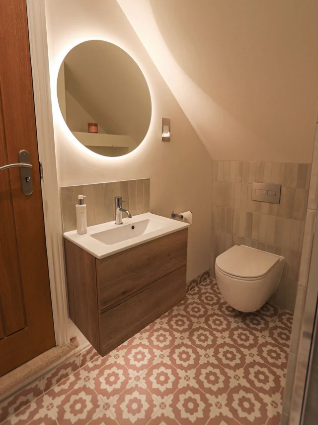 A space of her own 🧚‍♀️

We had the pleasure of transforming this en suite for our client’s young daughter, creating a space that feels fun, stylish and designed to grow with her. (Swipe to see the before!) 

From the blush pink patterned floor tiles, echoed in the shower niche, to the warm oak vanity and soft neutral tones, every detail was carefully considered to create a cohesive look with a pop of personality.

With the boiler removed from the original airing cupboard, we were able to increase the shower area and create deep recessed alcoves for additional storage. A discreet access panel ensures the remaining pipework can still be accessed for servicing when required.

Designed, supplied and installed by our in-house team from start to finish. ✨

Considering a bathroom renovation? Get in touch with our team today:

📞 01959 523 008
🌐 https://www.olympusbathrooms.co.uk/
 📧 info@olympusbathrooms.co.uk   

#pinkensuite #patternedtiles #ensuitedesign #ensuitetransformation #ensuiteinspo